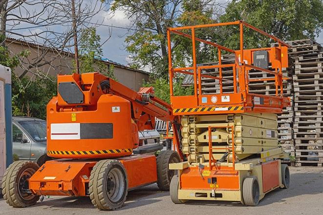 forklift maneuvering through warehouse aisles in Airway Heights